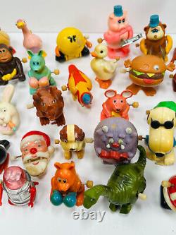Lot (40+) vtg Wind-Up Toys tomy ET pacman monsters garfield santa snoopy