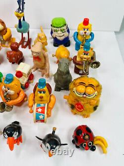 Lot (40+) vtg Wind-Up Toys tomy ET pacman monsters garfield santa snoopy