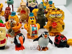 Lot (40+) vtg Wind-Up Toys tomy ET pacman monsters garfield santa snoopy