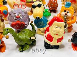 Lot (40+) vtg Wind-Up Toys tomy ET pacman monsters garfield santa snoopy