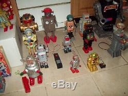 Lot of 37 Vintage Collectible Toy Robots. Wind Up and Battery Operated