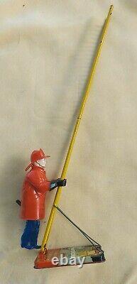 Louis Marx & Co. Smokey Joe climbing firefighter vintage wind up tin toy