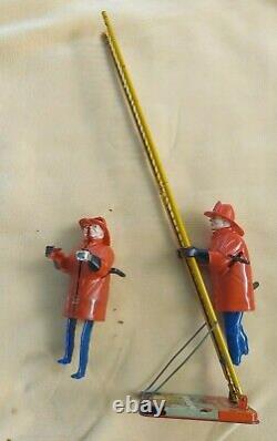 Louis Marx & Co. Smokey Joe climbing firefighter vintage wind up tin toy