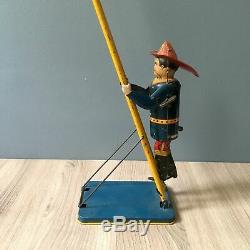 Louis Marx & Co. Smokey Joe climbing firefighter vintage wind up toy