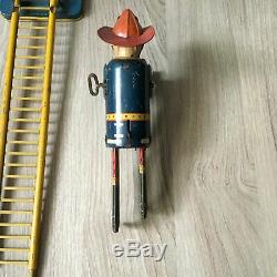 Louis Marx & Co. Smokey Joe climbing firefighter vintage wind up toy
