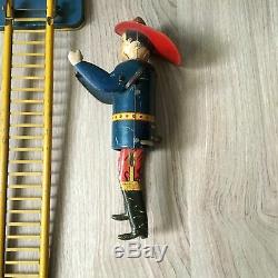 Louis Marx & Co. Smokey Joe climbing firefighter vintage wind up toy