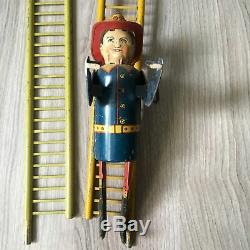 Louis Marx & Co. Smokey Joe climbing firefighter vintage wind up toy