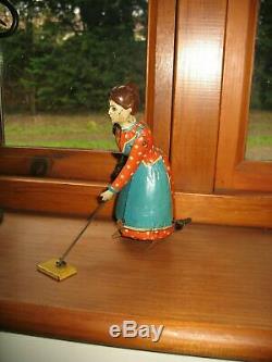 Lovely Distler Busy Lizzie Germany Tinplate Sweeping Lady Vintage Windup Tin Toy