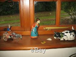 Lovely Distler Busy Lizzie Germany Tinplate Sweeping Lady Vintage Windup Tin Toy