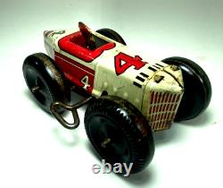 MARX TIN LITHO WINDUP SPEED BOATTAIL RACER #4 BALLOON TIRES RACE CAR with DRIVER