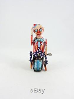 Mechanical CIRCUS CLOWN on Unicycle tin Wind-up T. P. S Japan vintage TPS bike toy