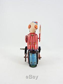 Mechanical CIRCUS CLOWN on Unicycle tin Wind-up T. P. S Japan vintage TPS bike toy