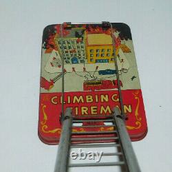 Neat Vintage Tin Litho Wind Up Marx Climbing Fireman