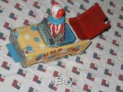Old Vintage Wakasuto Toys Japan Bump Car with Pop Up Clown Fiction Tin Litho Car