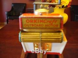 Orkin craft outboard with boat and stand bing, carette windup working vintage toy