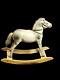 Outstanding late 1890s rocking horse toy, wood frame and composition body