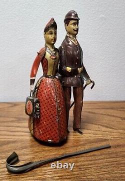 Rare German Tin Litho Toy Lehmann Family Walking On Broadway with Dog and Key