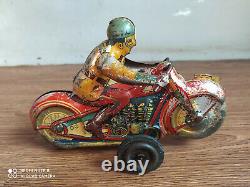 Rare vintage wind-up R. T. C. Tin toy Motor cycle of 50's (Working order)