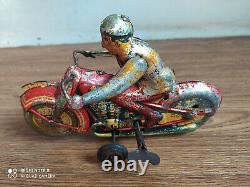 Rare vintage wind-up R. T. C. Tin toy Motor cycle of 50's (Working order)