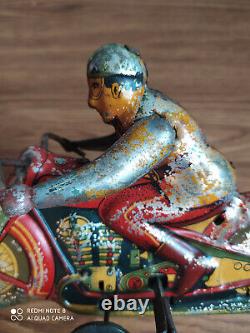 Rare vintage wind-up R. T. C. Tin toy Motor cycle of 50's (Working order)