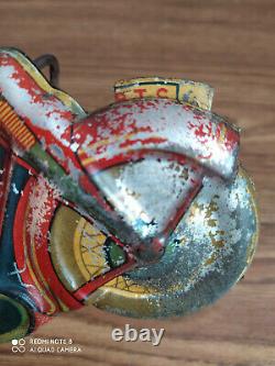 Rare vintage wind-up R. T. C. Tin toy Motor cycle of 50's (Working order)