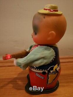 Red China Vintage Tin Wind up Battery Toy. Shooting Boy. MS 576