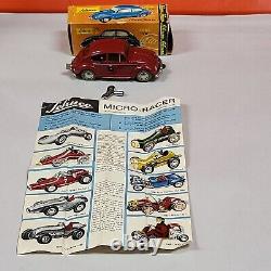 SCHUCO MICRO RACER 1046 VW Beetle Red Car TIN TOY With Key. REF56