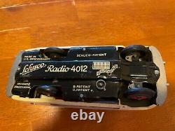 Schuco Tin radio car 4012