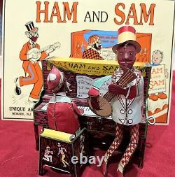 Strauss Tin Litho Windup Ham & Sam Piano And Sign. Dixie Blues