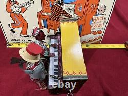 Strauss Tin Litho Windup Ham & Sam Piano And Sign. Dixie Blues