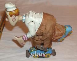 TPS ROLLING SKATING CHEF TIN WIND UP TOY 1950s