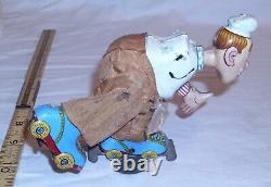 TPS ROLLING SKATING CHEF TIN WIND UP TOY 1950s