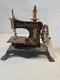 Toy sewing machine