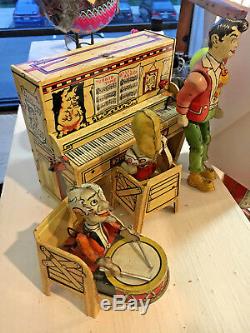 UNIQUE ART Lil' Abner DOGPATCH Music BAND Piano TIN Wind Up TOY 1945