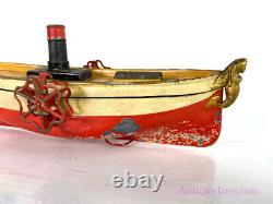 Uebelacker ca. 1900 Paddlewheeler Windup Tin Boat with Figurehead