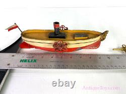 Uebelacker ca. 1900 Paddlewheeler Windup Tin Boat with Figurehead