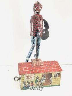 Unique Art JAZZBO-JIM Dancing Tin Wind Up Toy THE DANCER ON THE ROOF with BOX