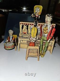 Unique Art Tin Wind-up Li'l Abner and his Dog patch Band