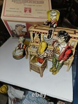 Unique Art Tin Wind-up Li'l Abner and his Dog patch Band
