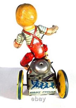 Unique Art Tin Wind-up Toy Kiddy Cyclist Boy on Tricycle (Circa 1940's)