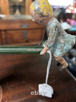 VINTAGE METAL UPSIDEDOWN TOY- Late1800s-Early 1900s