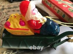 VINTAGE OCCUPIED JAPAN SANTA CLAUS ON SLED WIND UP TOY WithBOX AND KEY
