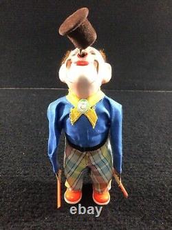 VINTAGE WIND UP DANCING CLOWN WithSPINNING TOP TOY WORKS! MAX CARL MONKEY HEAD