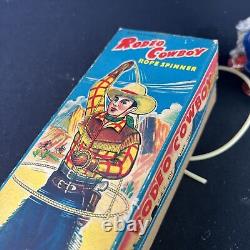 VTG Tin Wind Up Toy Mechanical Rodeo Cowboy Rope Spinner ALPS Japan in Box