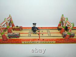 Very Neat Vintage Unique Art Mfg Tin Toy Wind Up Lincoln Tunnel Complete & Works