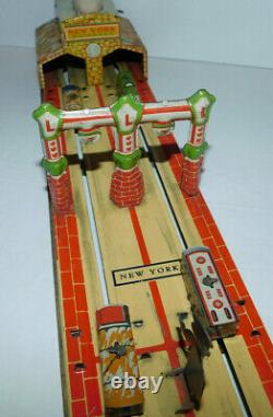 Very Neat Vintage Unique Art Mfg Tin Toy Wind Up Lincoln Tunnel Complete & Works