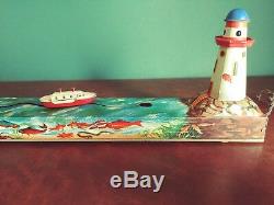 Very Rare 1930's Arnold Tin Wind-up Cap Electric Lighthouse Boat Ship with Or. Box