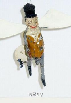 Very Rare Gunthermann Tin, Windup Hand-painted Dickens-type Character Flying Man