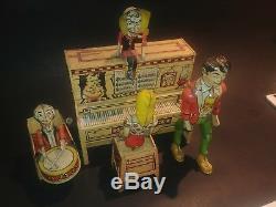 Vintage 1930's LIL Abner Tin Wind Up Piano Band