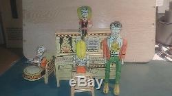 Vintage 1930's LIL Abner Tin Wind Up Piano Band